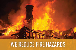 Building totally in flames and falling apart.