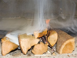 Is smoke lingering in your fireplace and beginning to spread inside your home instead of going outside via the chimney? You may have a chimney draft problem. Call us now.