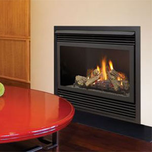 red coffee table in front of black fireplace insert and fire burning in it